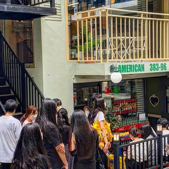 Guests waiting outside Hey George in a Yeonnam-dong lane